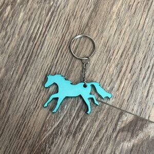 Teal colored horse keychain